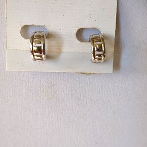 Vintage TRIFARI clip silvertone hoop earrings